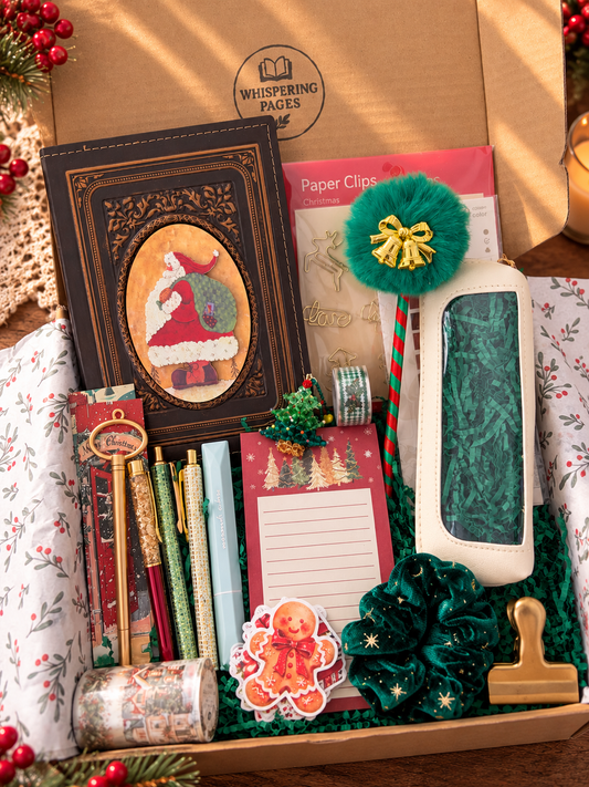 Christmas stationery gift box beautifully arranged with a vintage Santa journal, festive pens, magnetic notepad, pencil pouch, and holiday accessories.